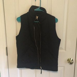 Women’s black zip-up vest